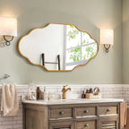Miroir mural asymétrique cadre métal doré 116 x 66 cm